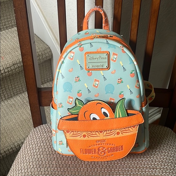 Loungefly Handbags - Disney Parks Loungefly 2024 Flower Garden orange bird backpack